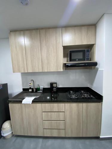 Dapur atau dapur kecil di Hermoso y cómodo apartamento