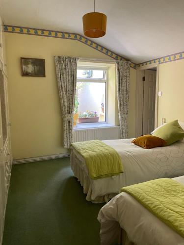 Postel nebo postele na pokoji v ubytování Achill View B&B