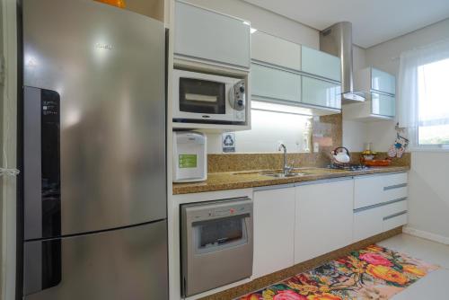 Dapur atau dapur kecil di Florianópolis Costão das Gaivotas Santinho