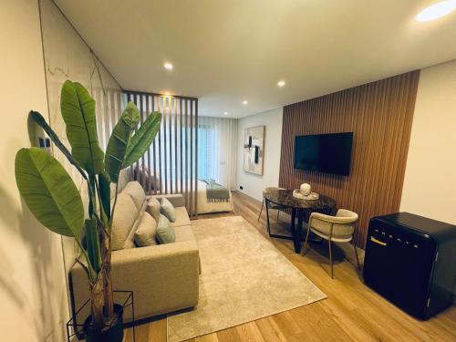 Μια τηλεόραση ή/και κέντρο ψυχαγωγίας στο Downtown Luxury Studio - Faro