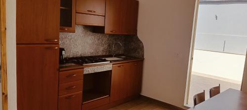 Kuchyň nebo kuchyňský kout v ubytování Piccola Azzurra bedrooms