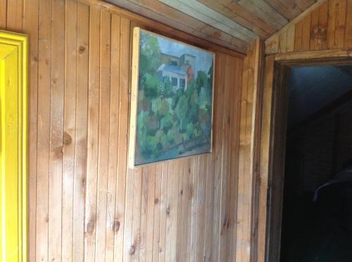 a painting hanging on the wall of a house at "MARKIZAS" Karaimu 25 in Trakai