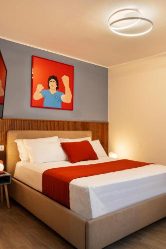 a bedroom with a large bed in a room at N'Ador Rooms in Naples