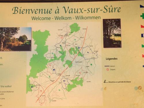 a map of the wales super cure on a wall at Modern Cottage in Vaux-sur-Sûre with Sauna in Morhet