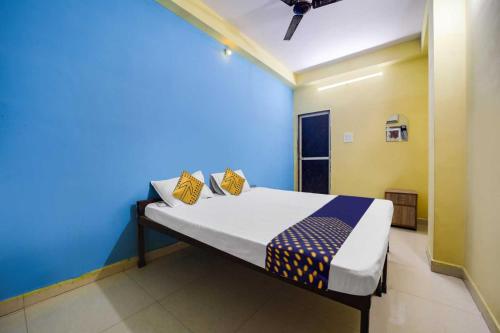 Katil atau katil-katil dalam bilik di Hotel O Sanskardhani Inn