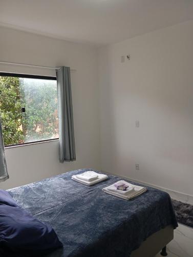 Katil atau katil-katil dalam bilik di Apartamento com piscina