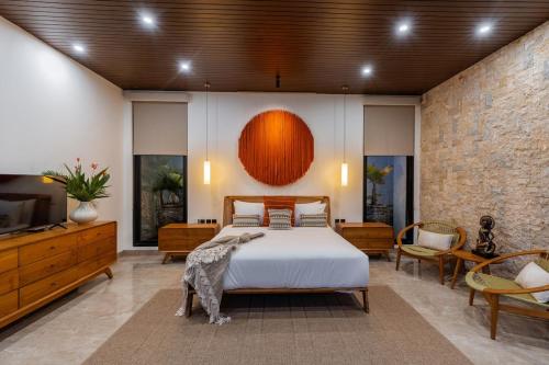 Postel nebo postele na pokoji v ubytování Nococu Luxury Villa