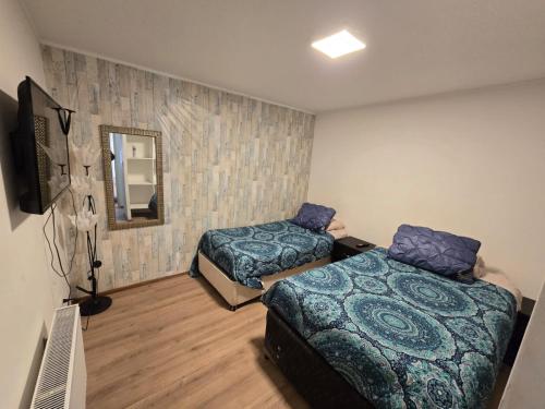 TV a/nebo společenská místnost v ubytování CASA acogedora y familiar en pto natales
