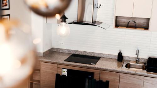 Cuisine ou kitchenette dans l'établissement Casa Nostra