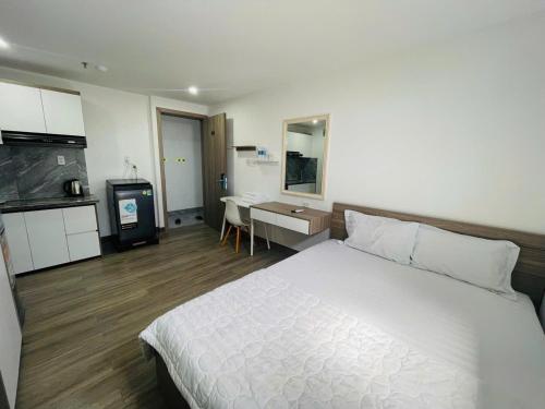 Η κουζίνα ή μικρή κουζίνα στο Royal Hotel & Apartment