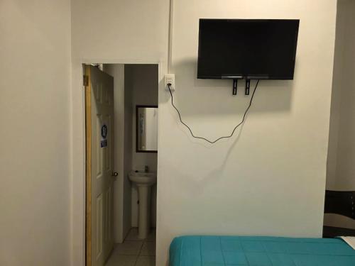 TV a/nebo společenská místnost v ubytování Hostal nancy