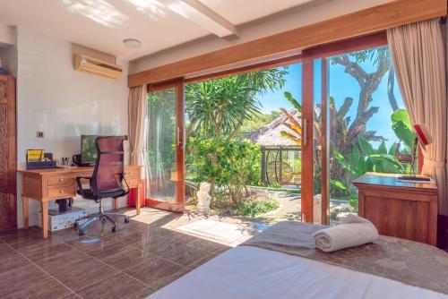 Giường trong phòng chung tại Bougainville Hill Villa