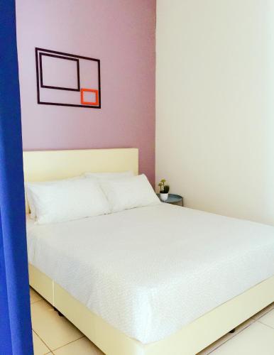 Postel nebo postele na pokoji v ubytování ELECTUS HOME at MIDHILLS GENTING - FREE WiFi & Parking