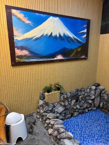 Coin salon dans l'établissement 新規オープン岩風呂付ゲストハウス織姫
