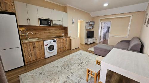 Η κουζίνα ή μικρή κουζίνα στο Коттедж Royal Beach К14