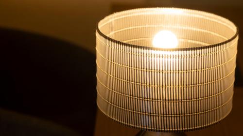 a close up of a lit up candle at Riverte Kyoto Kamogawa in Kyoto