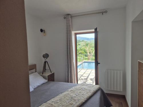 Postel nebo postele na pokoji v ubytování Casa dos avós