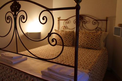 Кровать или кровати в номере Casa do Ramiscal - Eido do Pomar