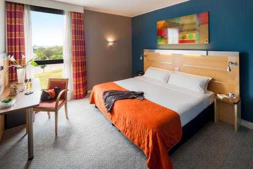 Postel nebo postele na pokoji v ubytování Idea Hotel Milano San Siro