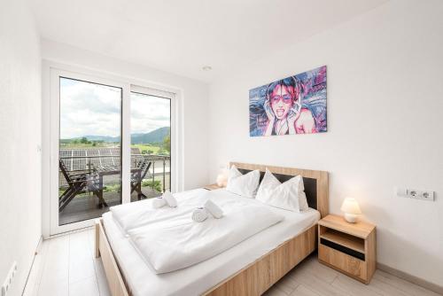 Postel nebo postele na pokoji v ubytování Dreamhouse 1 Apartment - by myNests