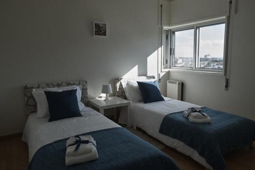 A bed or beds in a room at Apartamento Viana Vista