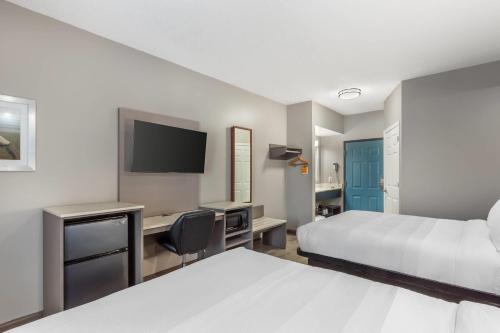 Postel nebo postele na pokoji v ubytování Quality Inn Wilmington