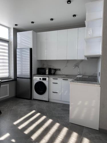 Una cocina o zona de cocina en Board apart hotel