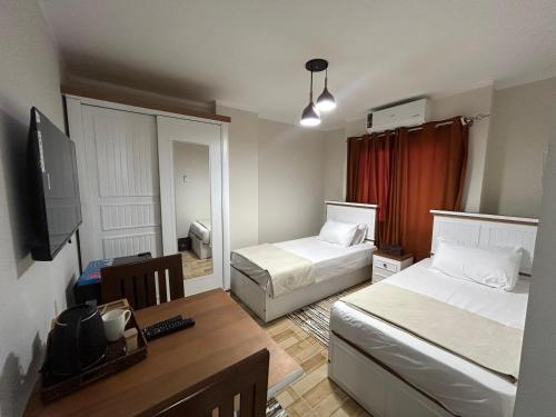 Postel nebo postele na pokoji v ubytování Stayline hotel apartments 5 mins from Cairo airport