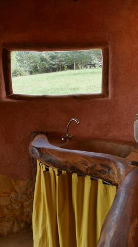 a sink in a room with a window at gîte de l'aigle in Aouste-sur-Sye