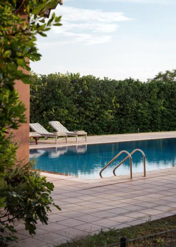 Πισίνα στο ή κοντά στο Calm Retreat Villa Lagonisi