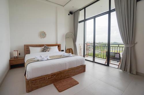 Ένα ή περισσότερα κρεβάτια σε δωμάτιο στο The Mirea Guest House