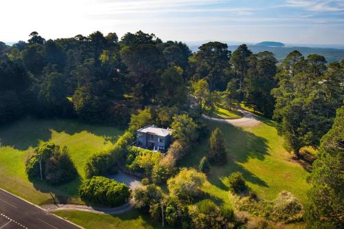 an aerial view of a house in the middle of a field at Daybreaker Daylesford in Daylesford