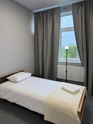 Postel nebo postele na pokoji v ubytování Bastion
