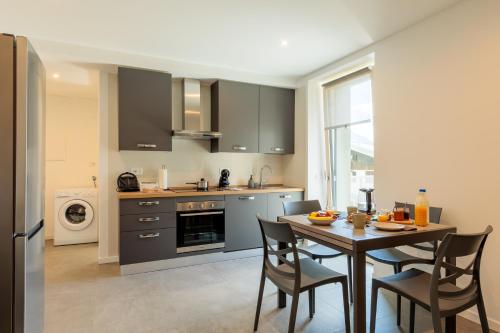 Dapur atau dapur kecil di Revo Apartments - Meriggio