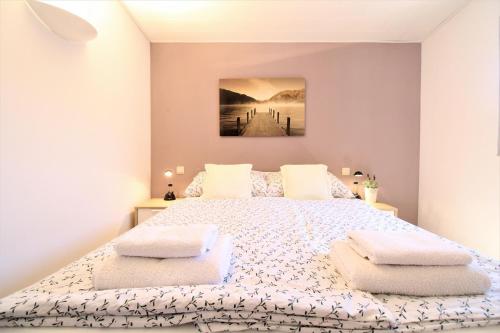 Ένα ή περισσότερα κρεβάτια σε δωμάτιο στο Apartments Frideric