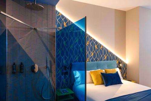 Hotel Pathos by Mimood Aparthotelsにあるベッド