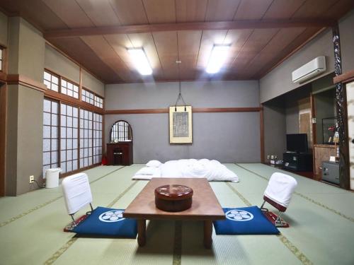 Katil atau katil-katil dalam bilik di Takao Kanko Hotel