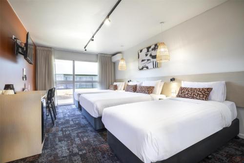 Un ou plusieurs lits dans un hébergement de l'établissement Nightcap at Dalrymple Hotel