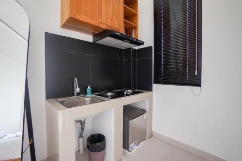 Η κουζίνα ή μικρή κουζίνα στο The Mirea Guest House