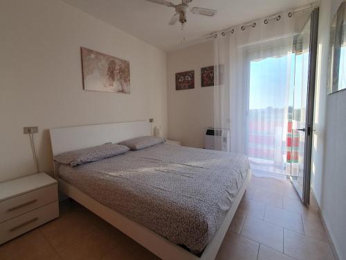 Postel nebo postele na pokoji v ubytování Appartamento Isola Verde Chioggia