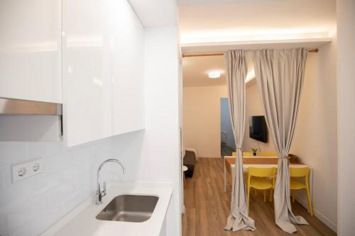 Kuchyň nebo kuchyňský kout v ubytování Apartamentos corazón de Chamberí