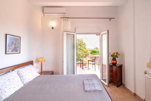 Giường trong phòng chung tại Zeusplace Sunny Villa