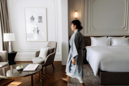 Ένα ή περισσότερα κρεβάτια σε δωμάτιο στο Souphattra Hotel Vientiane