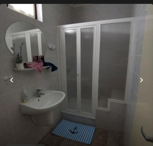 Kúpeľňa v ubytovaní Miranda Apartmanház