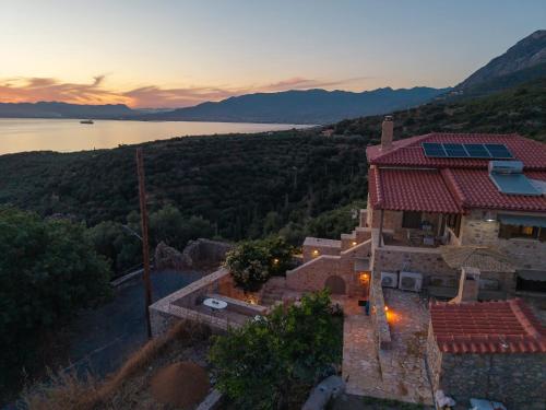 Niki's Tower - Serene Seaview Stone Getaway