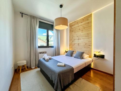 เตียงในห้องที่ Molina Molinísimo