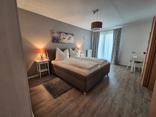 Ένα ή περισσότερα κρεβάτια σε δωμάτιο στο Feel Nice - Apartments