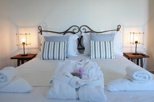 Katil atau katil-katil dalam bilik di The Beach House - Apartments & Studios