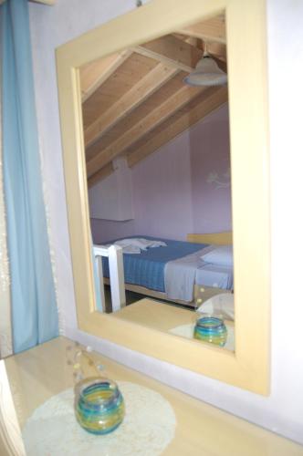 Ένα ή περισσότερα κρεβάτια σε δωμάτιο στο Angelina Apartments