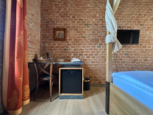 Postel nebo postele na pokoji v ubytování Hotel Mariánský Dvůr